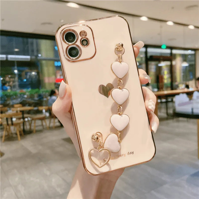 Capinha de Celular para Iphone com Bracelete de Segurança em Corações
